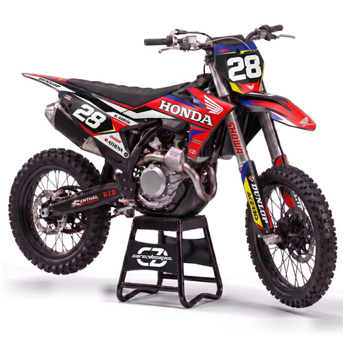 Kit adhesivos motocross Honda - Podium, en negro, rojo, azul y amarillo con dorsal 28