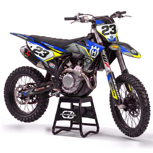 Kit adhesivos motocross Husqvarna - Camo Blue, en camuflaje azul y amarillo con dorsal 23